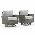 Chaises pivotantes en résine tressée gris avec coussins